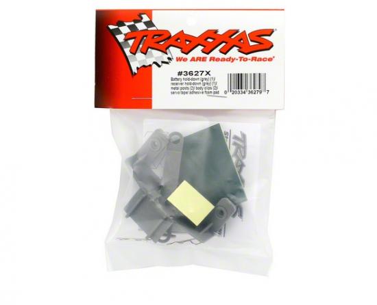 Traxxas Battery hold-down (grey) (1) / receiver hold-down (grey) (1) / metal posts (2)/ spacers (2)/ body clips (2)/ servo tape/ adhesive foam pad