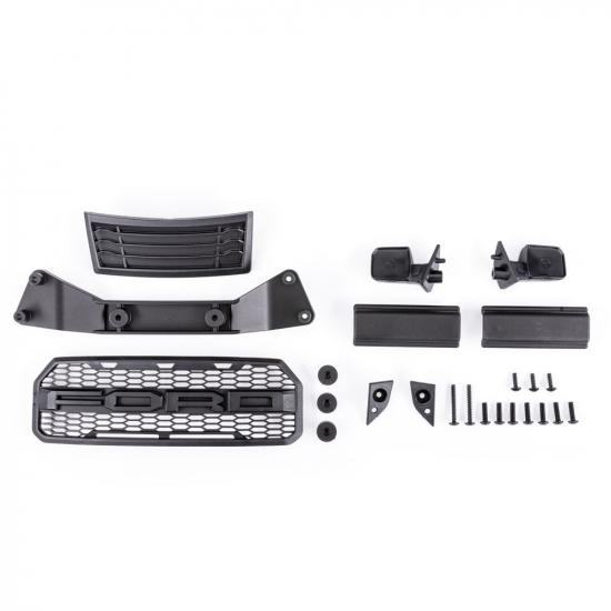 Traxxas Grille/ grille mount/ mirrors, side (left + right)/ mirror mounts (left + right)/ body mount adapter/ rear latch retainers (2)/ 2.6x8mm BCS (self-tapping) (3)/ 2.6x20mm BCS (self-tapping) (2)/ 3x10mm BCS (8) (fits